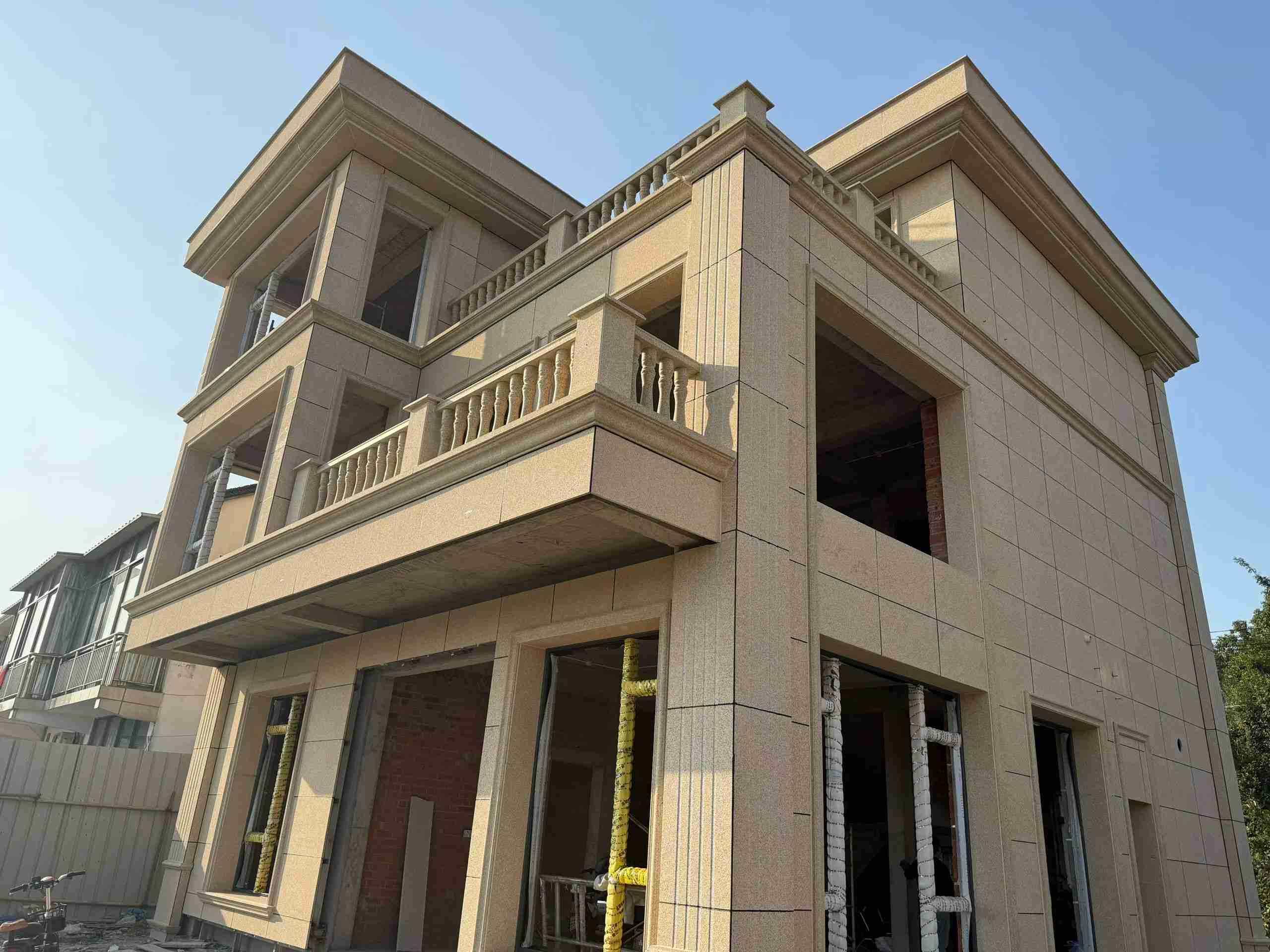 永州 黄金麻花岗岩石材荔枝面外墙干挂效果展示